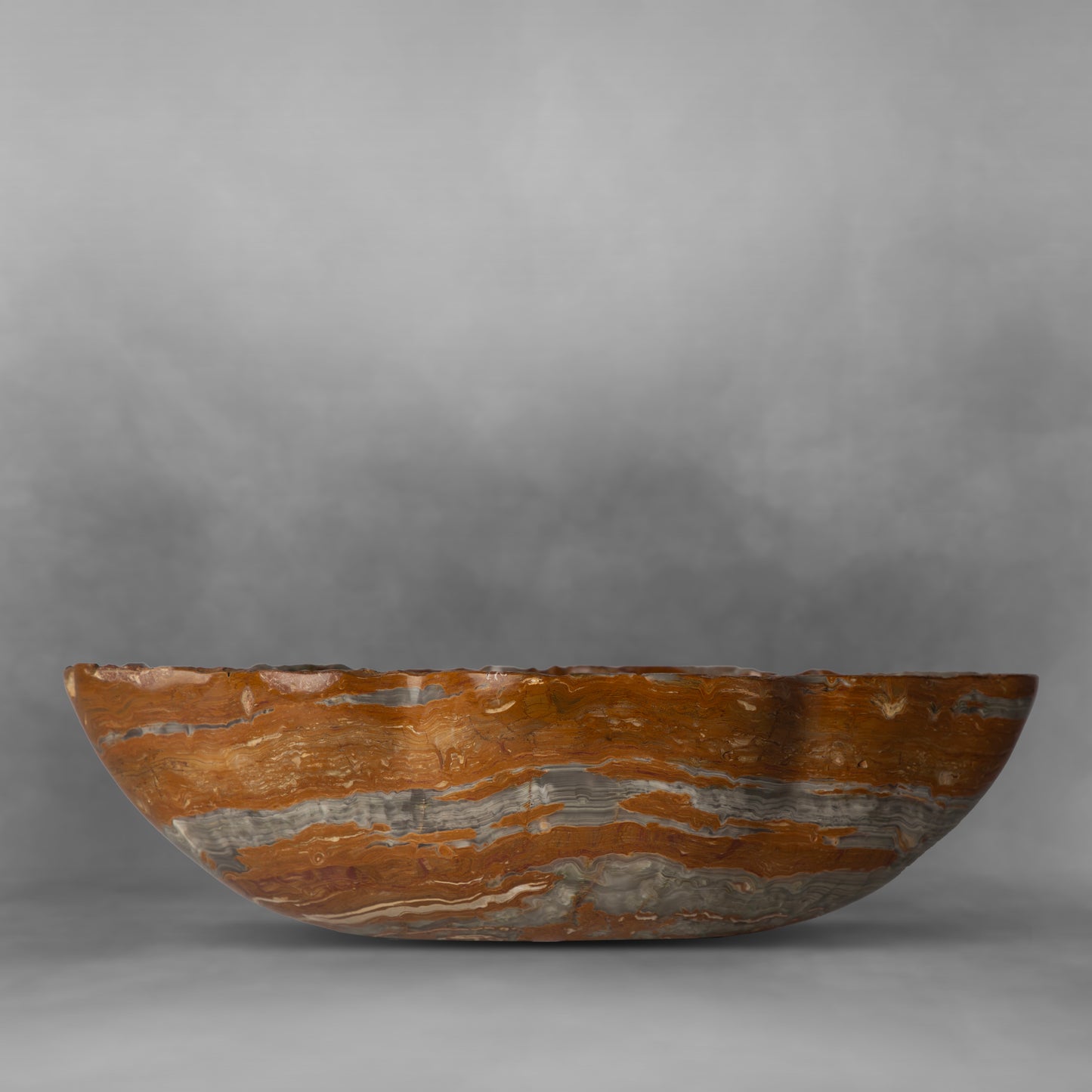 Deep and vibrant brown and gray, elegant onyx bowl