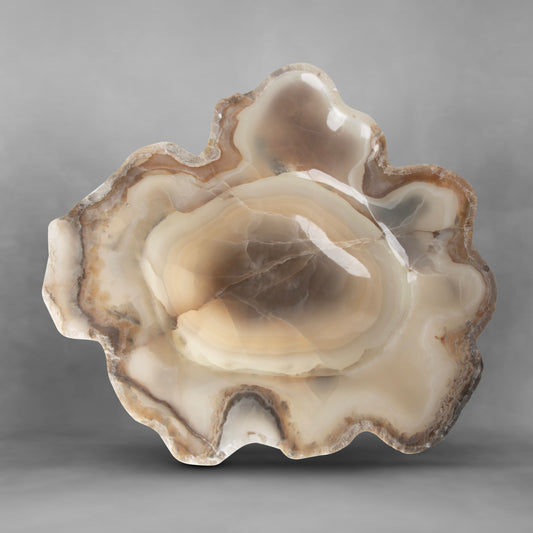 Beautiful and elegant with irregular shapes forming a pearl bowl in onyx