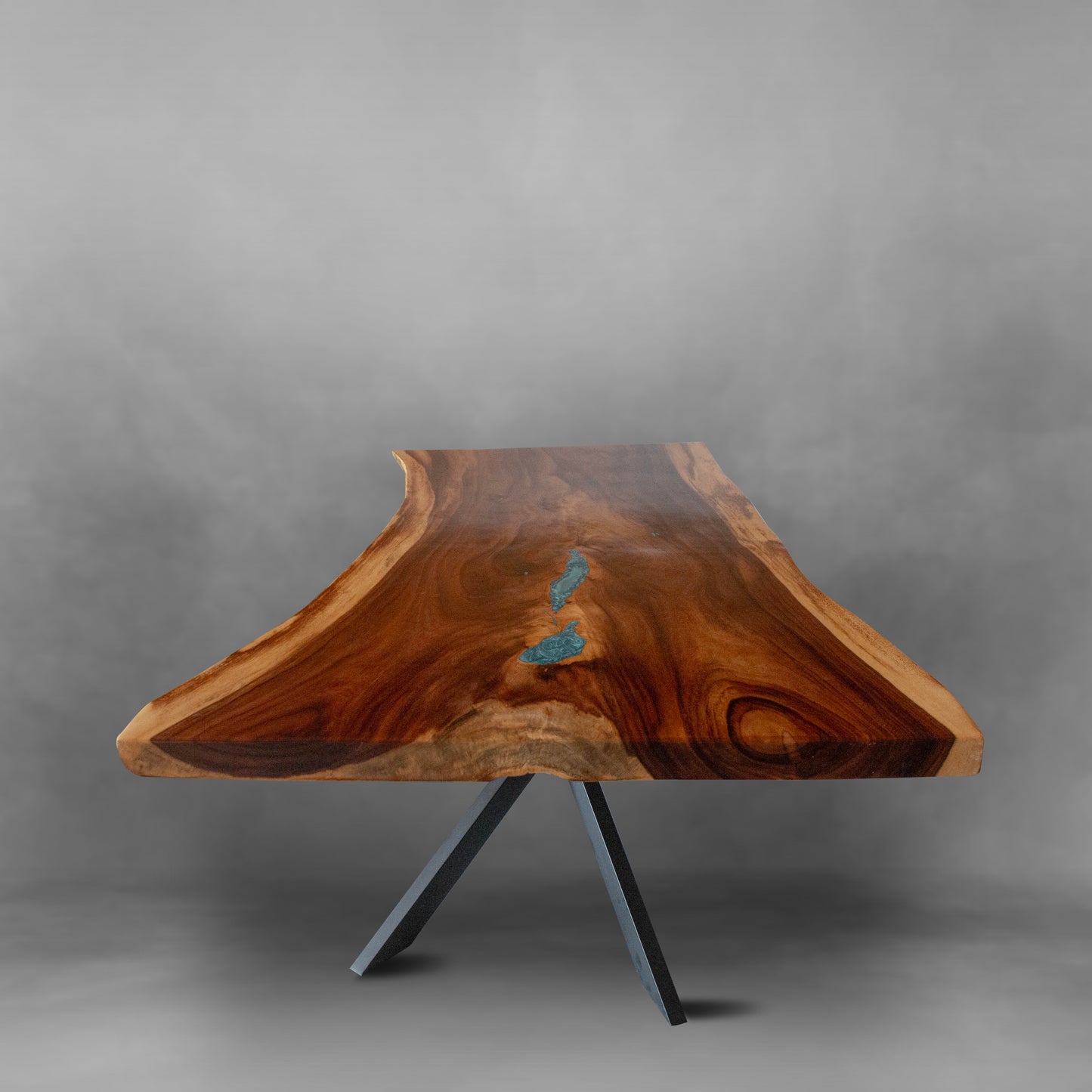 Exquisite live edge dinning table carved from acacia wood with a beautiful turquoise detail