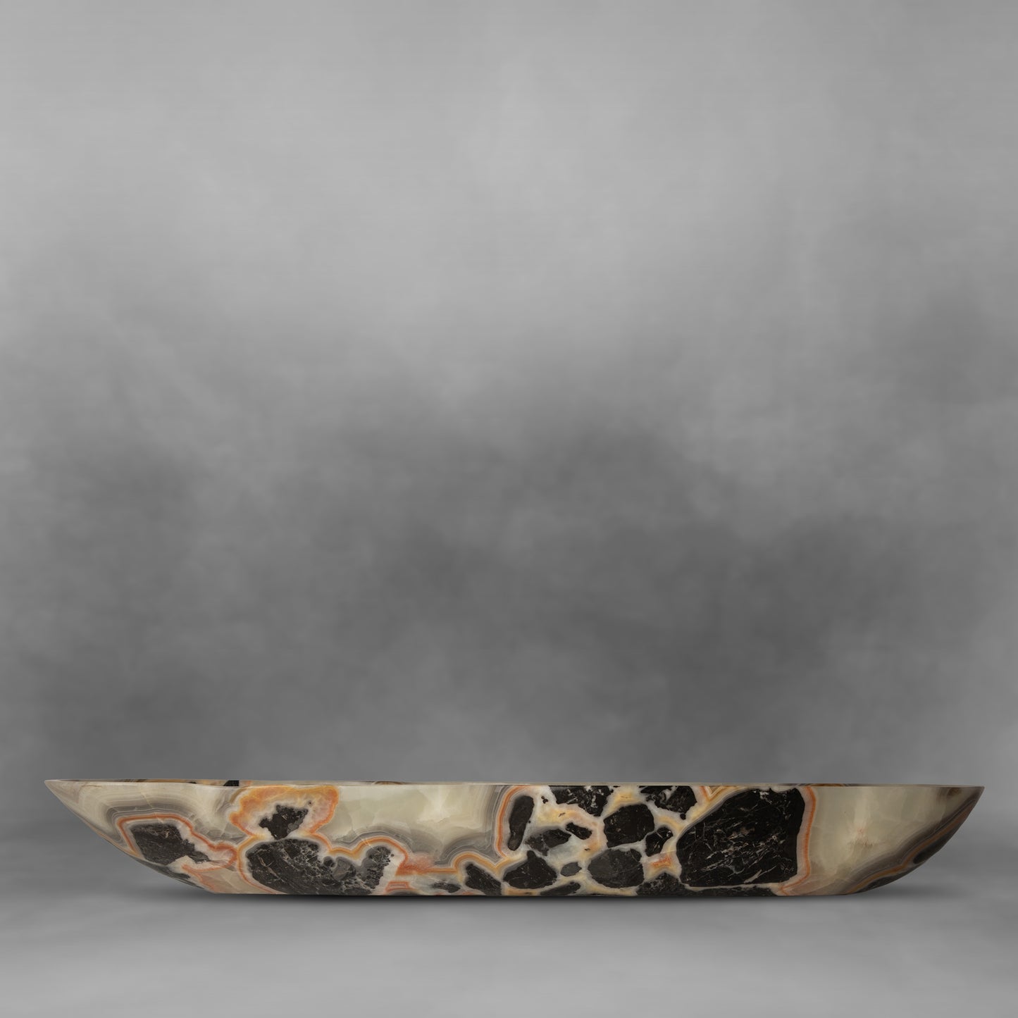 Unusual and elegant canoe color combination, black, orange and pearl, large onyx bowl