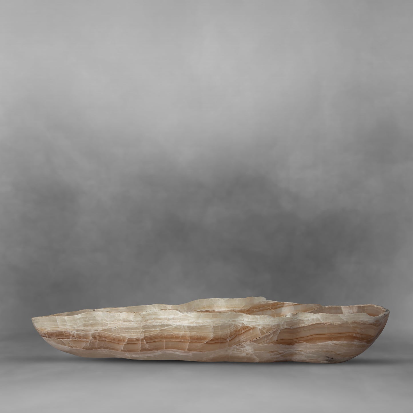 Delicate canoe, patterns in light brown with white, large onyx bowl