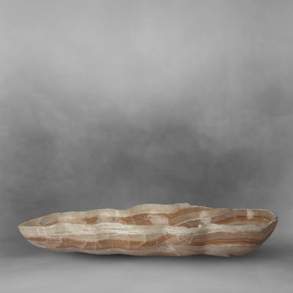 Delicate canoe, patterns in light brown with white, large onyx bowl